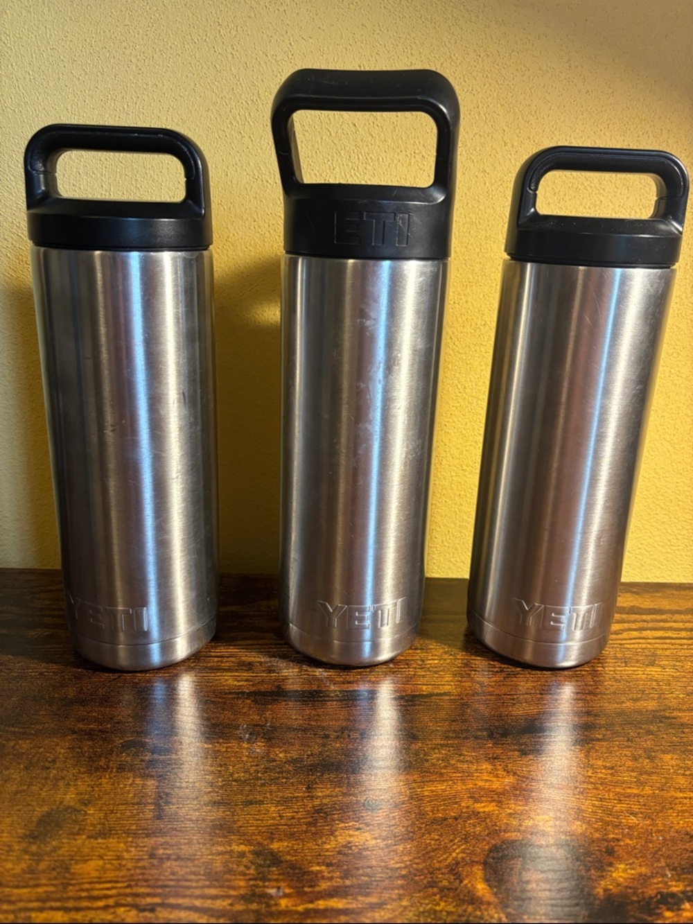 3 Yeti Stainless Steel Bottles with Black Loop Handles